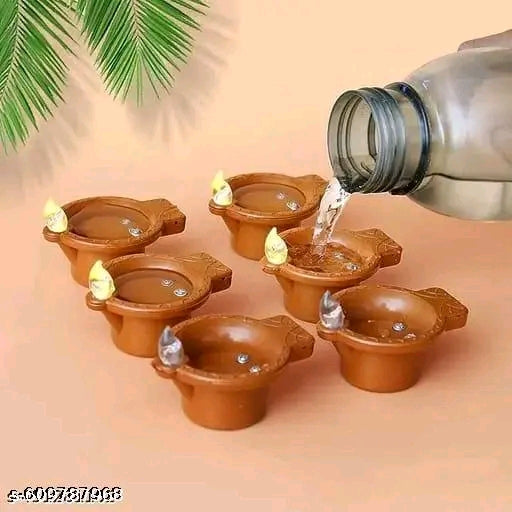 ✨ "Light up your Diwali with smart glow — Water Sensor Diya Lamps that shine when touched by water!” 💧🪔